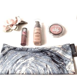 Set of 4 Lipstick,Foundation,Blush,& Makeup bag.